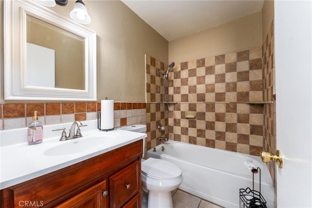 1076 N Ironwood Ave, Rialto, CA 92376 - bathroom featuring toilet, shower / bathing tub combination, tile patterned flooring, and vanity