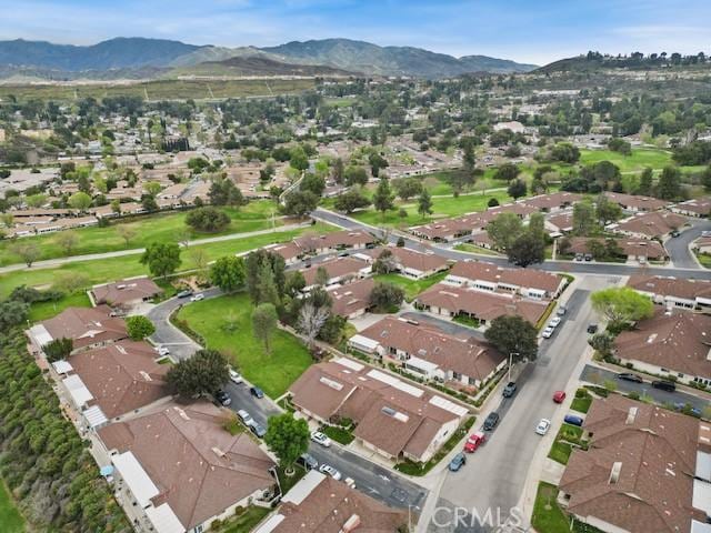 aerial view featuring a mountain view and a residential view