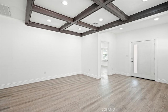 foyer entrance featuring coffered ceiling, baseboards, beam ceiling, light wood-style floors, and visible vents