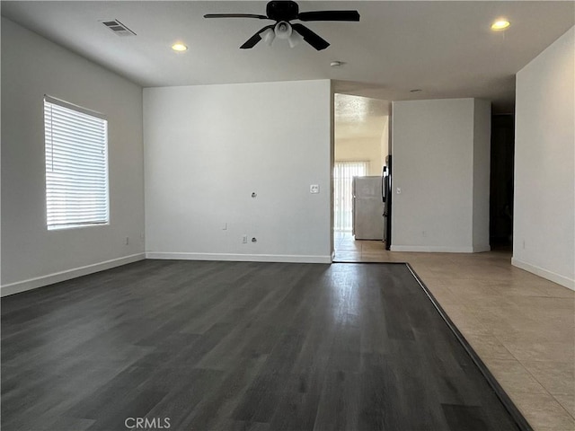 empty room featuring recessed lighting, baseboards, ceiling fan, and visible vents