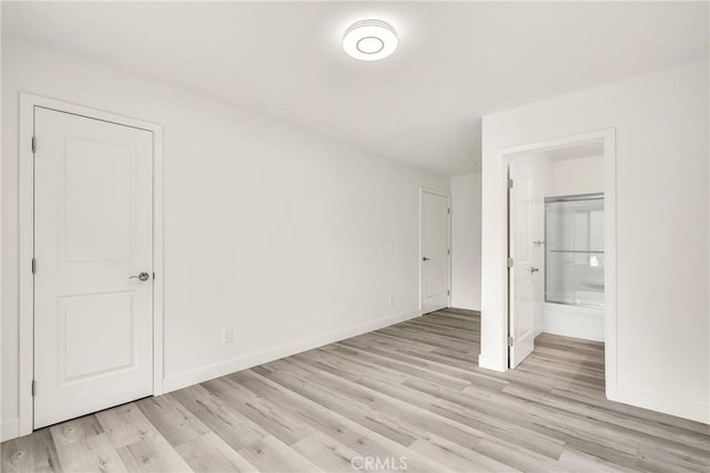 914 Fairview Ave Unit 15, Arcadia, CA 91007 - unfurnished bedroom with light wood-style flooring and connected bathroom
