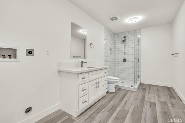 914 Fairview Ave Unit 15, Arcadia, CA 91007 - bathroom with vanity, wood finished floors, and a stall shower