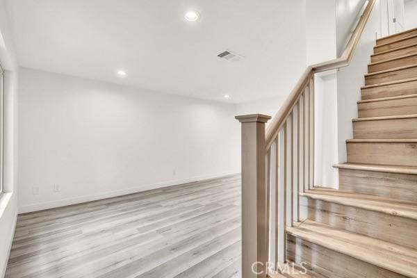 914 Fairview Ave Unit 15, Arcadia, CA 91007 - stairway featuring recessed lighting and wood finished floors