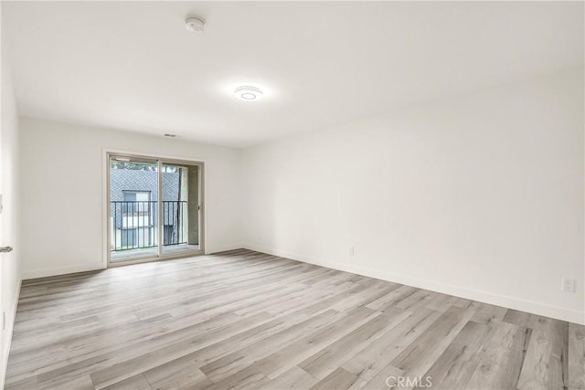 914 Fairview Ave Unit 15, Arcadia, CA 91007 - empty room with a smoke detector and light wood-type flooring