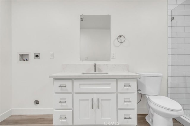 914 Fairview Ave Unit 15, Arcadia, CA 91007 - bathroom featuring vanity, wood finished floors, and a tile shower