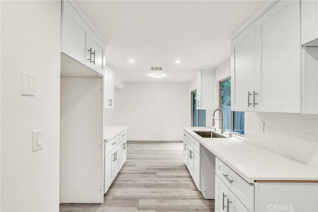 914 Fairview Ave Unit 15, Arcadia, CA 91007 - kitchen featuring light countertops, recessed lighting, dishwasher, and white cabinets