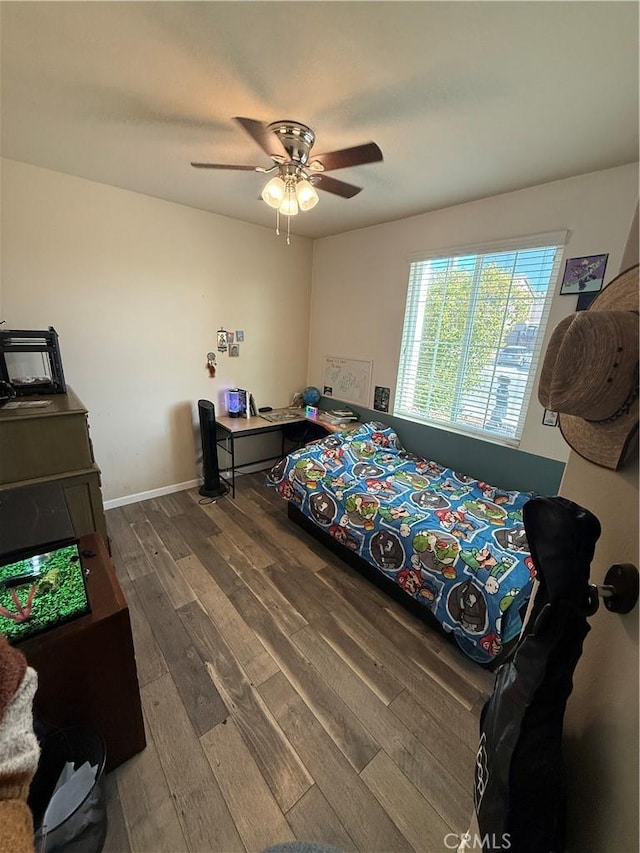 30130 Pine Needle Rd, Menifee, CA 92585 - bedroom with wood finished floors, ceiling fan, and baseboards