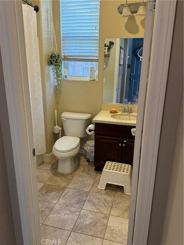 30130 Pine Needle Rd, Menifee, CA 92585 - bathroom with vanity, toilet, and a shower with curtain
