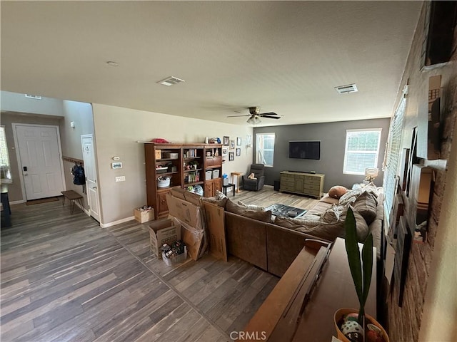 30130 Pine Needle Rd, Menifee, CA 92585 - living area featuring wood finished floors, ceiling fan, and baseboards