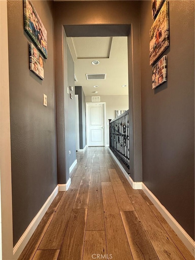 30130 Pine Needle Rd, Menifee, CA 92585 - corridor featuring hardwood / wood-style flooring and baseboards