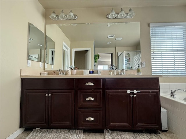 30130 Pine Needle Rd, Menifee, CA 92585 - full bathroom featuring double vanity, a garden tub, and a stall shower