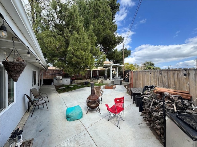 40451 Rome Beauty Way, Cherry Valley, CA 92223 - fenced backyard with a fire pit and a patio