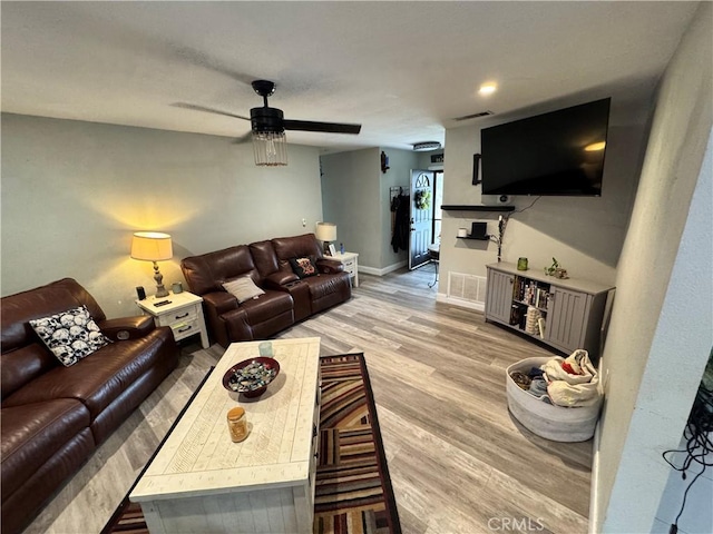 40451 Rome Beauty Way, Cherry Valley, CA 92223 - living room featuring light wood finished floors, ceiling fan, and baseboards