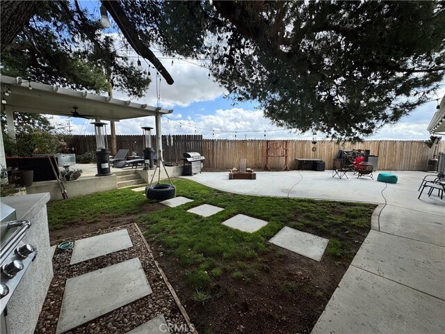40451 Rome Beauty Way, Cherry Valley, CA 92223 - fenced backyard with a patio