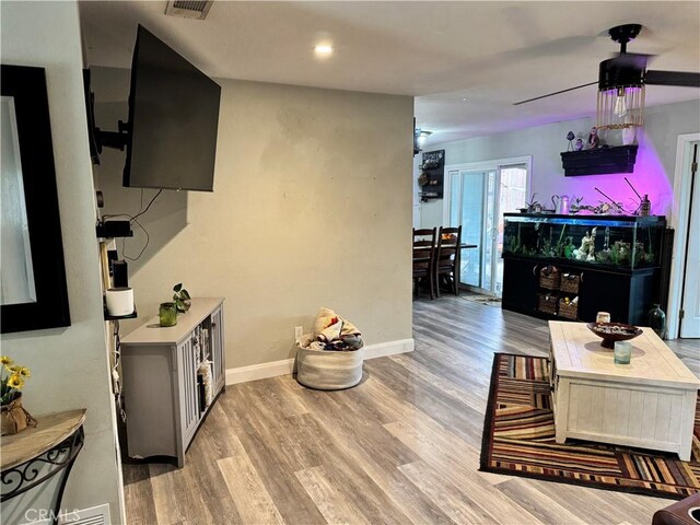 40451 Rome Beauty Way, Cherry Valley, CA 92223 - living room featuring wood finished floors and baseboards