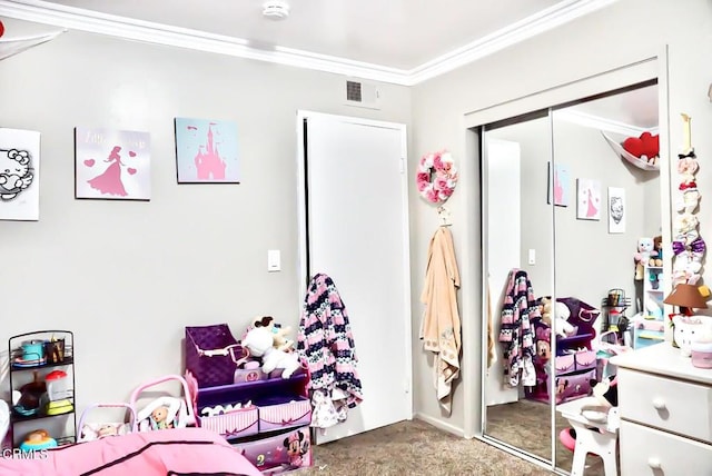 bedroom with a closet, carpet, visible vents, and ornamental molding