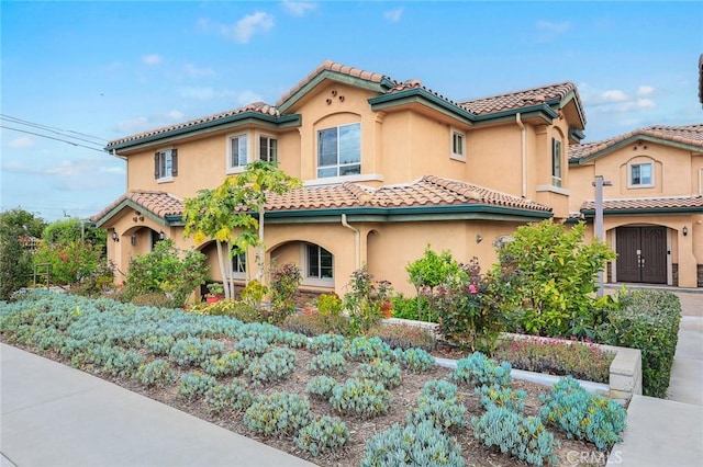 5402 Peck Rd, El Monte, CA 91732 - mediterranean / spanish house with a tiled roof and stucco siding