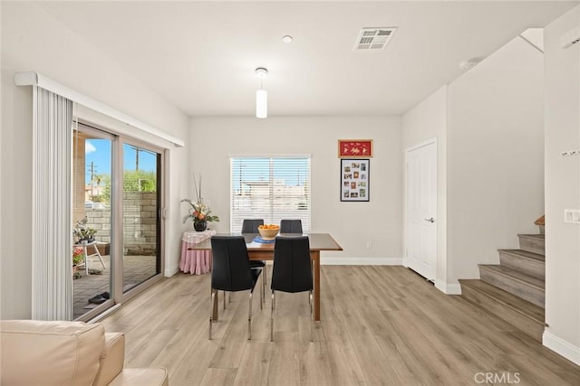 5402 Peck Rd, El Monte, CA 91732 - dining area featuring light wood-style flooring and stairs