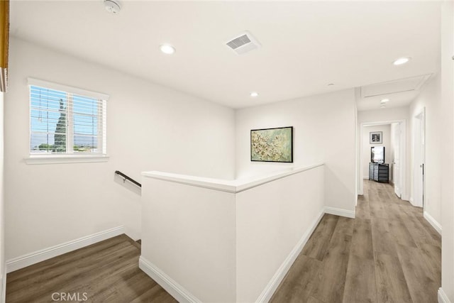 5402 Peck Rd, El Monte, CA 91732 - corridor with an upstairs landing, wood finished floors, and recessed lighting
