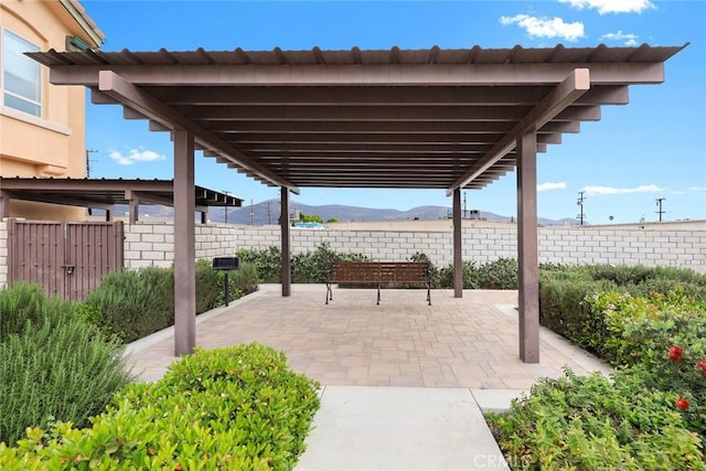 5402 Peck Rd, El Monte, CA 91732 - fenced backyard featuring a mountain view and a patio