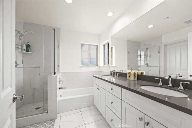 5402 Peck Rd, El Monte, CA 91732 - bathroom with a shower stall, a garden tub, double vanity, recessed lighting, and tile patterned floors