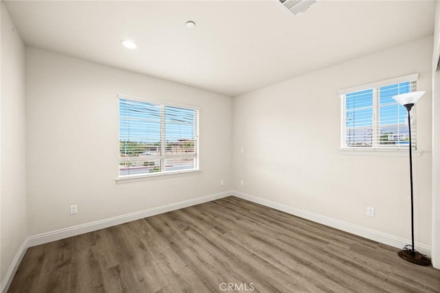 5402 Peck Rd, El Monte, CA 91732 - spare room featuring wood finished floors, healthy amount of natural light, and recessed lighting