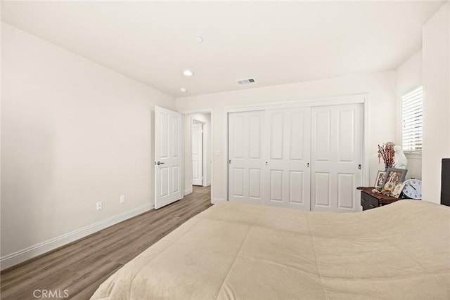 5402 Peck Rd, El Monte, CA 91732 - bedroom with wood finished floors, recessed lighting, and a closet