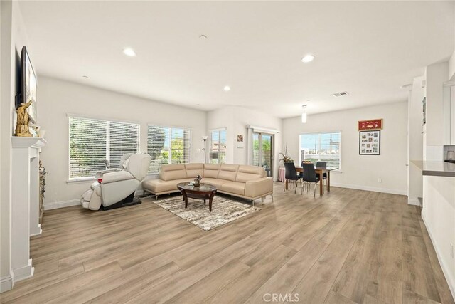 5402 Peck Rd, El Monte, CA 91732 - living area featuring light wood-style flooring and recessed lighting