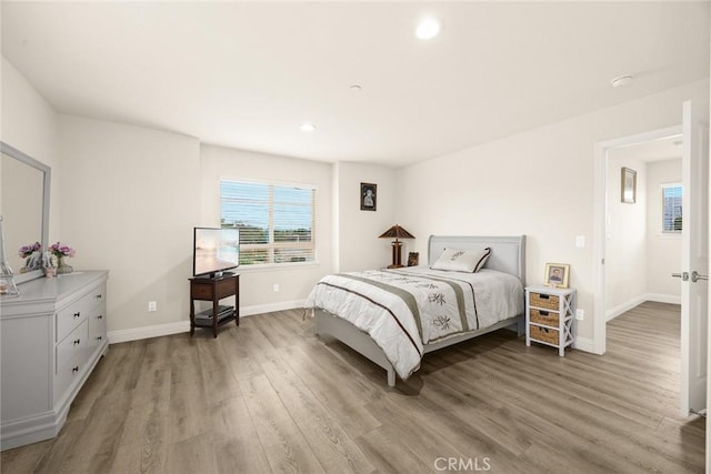 5402 Peck Rd, El Monte, CA 91732 - bedroom with light wood-style floors and recessed lighting