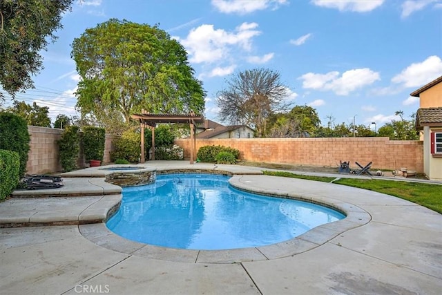 view of swimming pool with a fenced backyard, a patio area, and a pool with connected hot tub