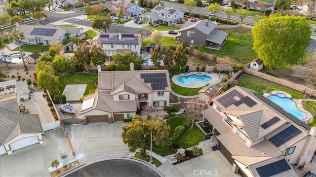 aerial view of residential area featuring a pool
