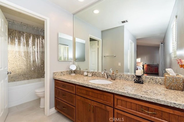 bathroom featuring toilet, vanity, tile patterned flooring, recessed lighting, and shower / tub combo with curtain