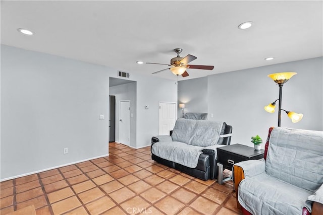 living area featuring ceiling fan, visible vents, and recessed lighting