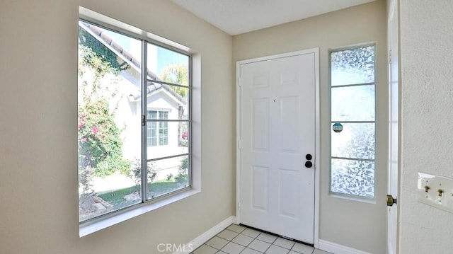 45299 Esmerado Ct, Temecula, CA 92592 - entrance foyer with healthy amount of natural light, light tile patterned floors, and baseboards