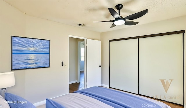 45299 Esmerado Ct, Temecula, CA 92592 - bedroom with a closet, baseboards, and a ceiling fan