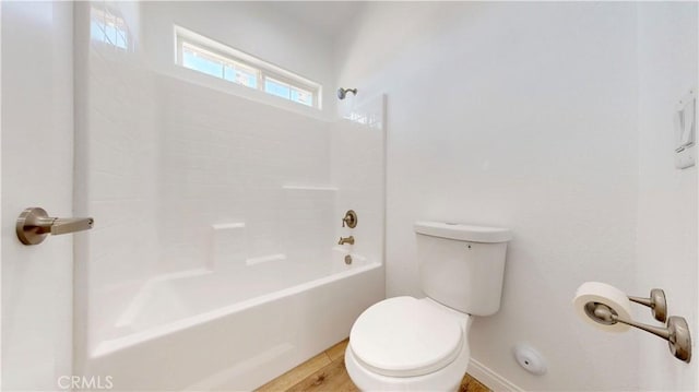 full bathroom with shower / washtub combination and toilet