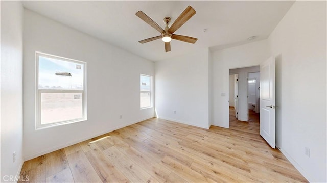 unfurnished bedroom featuring light wood-style flooring and ceiling fan