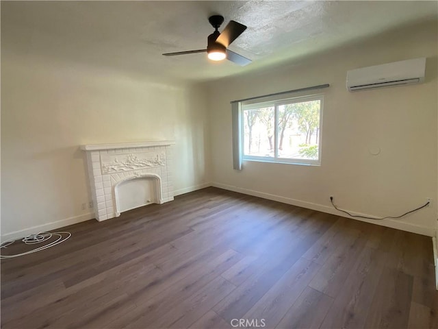 5101 Lindsey Ave, Pico Rivera, CA 90660 - unfurnished living room with a wall mounted air conditioner, baseboards, dark wood-style flooring, ceiling fan, and a fireplace