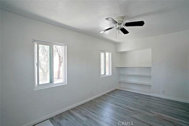 5101 Lindsey Ave, Pico Rivera, CA 90660 - unfurnished room featuring baseboards, wood finished floors, and ceiling fan
