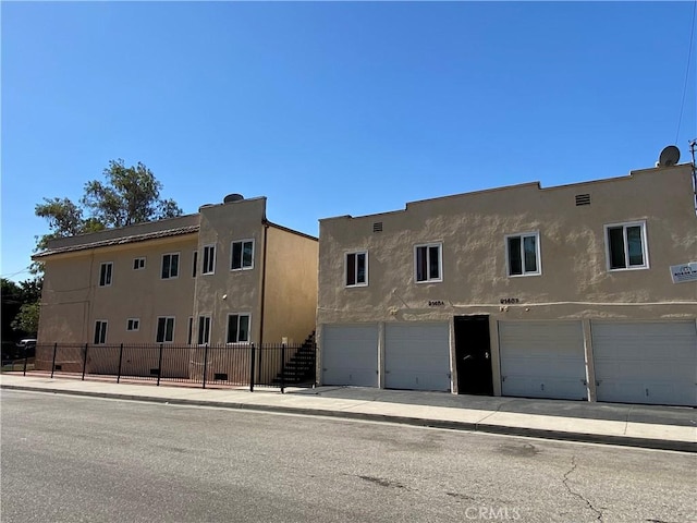 5101 Lindsey Ave, Pico Rivera, CA 90660 - view of building exterior featuring a garage