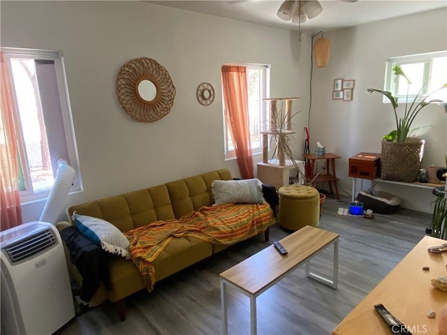5101 Lindsey Ave, Pico Rivera, CA 90660 - living room featuring wood finished floors, plenty of natural light, and ceiling fan