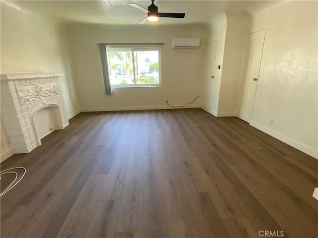 5101 Lindsey Ave, Pico Rivera, CA 90660 - unfurnished living room with a wall unit AC, a ceiling fan, dark wood finished floors, a fireplace, and baseboards