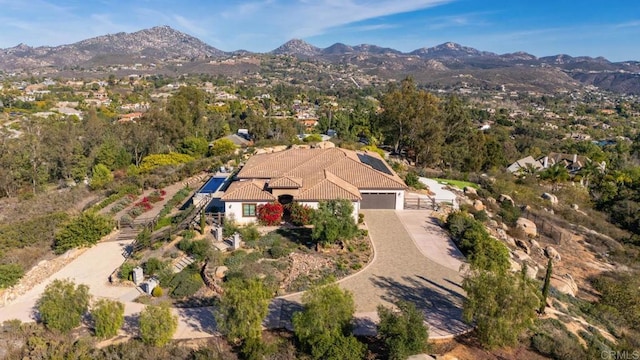bird's eye view with a mountain view