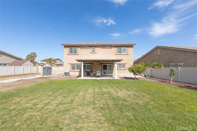 14917 Landerwood Dr, Eastvale, CA 92880 - rear view of house with a storage shed, a patio, stucco siding, an outdoor structure, and cooling unit