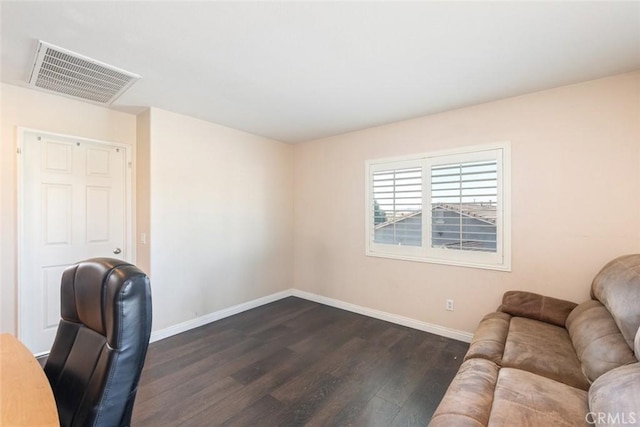 14917 Landerwood Dr, Eastvale, CA 92880 - office area featuring dark wood-style floors and baseboards