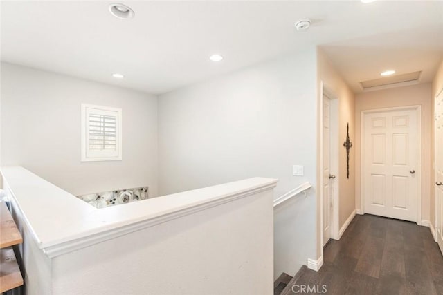 14917 Landerwood Dr, Eastvale, CA 92880 - corridor with dark wood-type flooring, recessed lighting, baseboards, and attic access