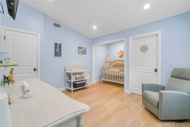 18750 Keswick St, Reseda, CA 91335 - bedroom featuring light wood-style floors, vaulted ceiling, and recessed lighting