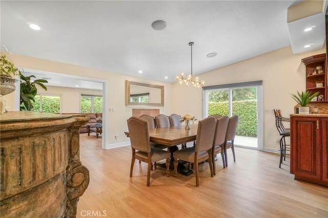 18750 Keswick St, Reseda, CA 91335 - dining room with light wood-type flooring, plenty of natural light, a chandelier, recessed lighting, and lofted ceiling