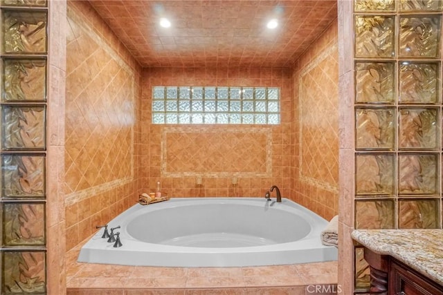 18750 Keswick St, Reseda, CA 91335 - full bath featuring a bath, vanity, recessed lighting, and tile walls