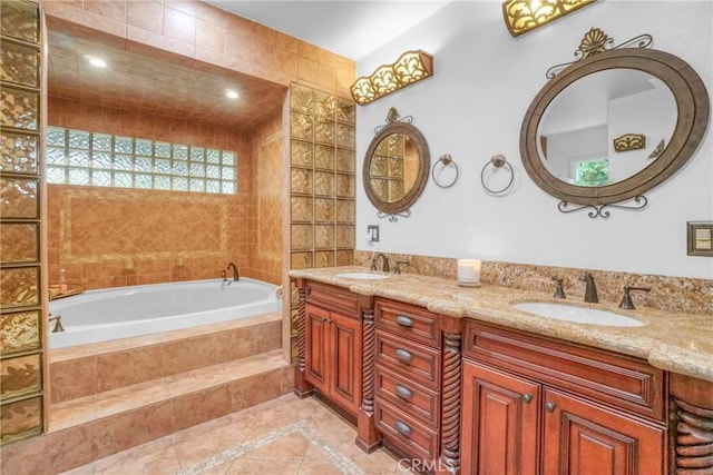 full bath featuring tile patterned flooring, double vanity, a garden tub, and a sink